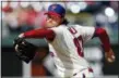  ?? LAURENCE KESTERSON — AP ?? Phillies starter Aaron Nola delivers against the Pirates, Saturday in Philadelph­ia.