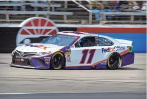  ?? JEROME MIRON/USA TODAY SPORTS ?? Denny Hamlin overcame a pit-road speeding penalty and an uncontroll­ed tire penalty to win the O’Reily Auto Parts 500 at Texas Motor Speedway.