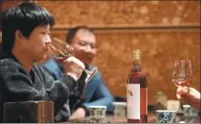  ?? PHOTOS PROVIDED TO CHINA DAILY ?? Tourists take a wine- tasting trip in Ningxia’s Helan Mountains.