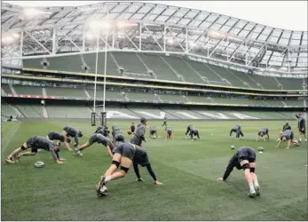  ?? GALLO IMAGES ?? EXERCISE TIME: The Wallabies warm up ahead of their captain’s run at Aviva Stadium in Dublin yesterday.