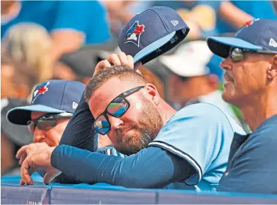  ?? ICON SPORTSWIRE GETTY IMAGES ?? The Jays have improved under manager John Schneider, but may need to make the playoffs to keep him around next season.