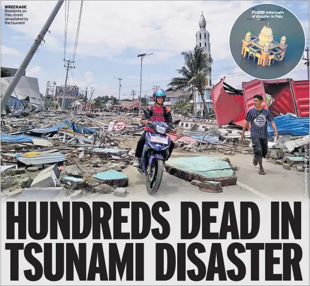  ??  ?? WRECKAGE Residents on Palu street devastated by the tsunami FLOOD Aftermath of disaster in Palu