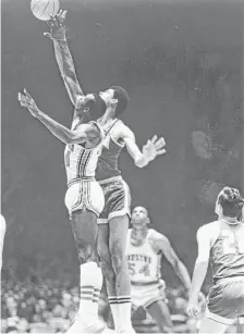  ?? Special Collection­s, University of Houston Libraries ?? Houston’s Elvin Hayes, left, and UCLA’s Lew Alcindor were the centerpiec­es for their respective teams in the milestone game.