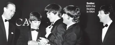  ??  ?? Smiles: With the Beatles in 1964