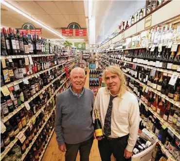  ?? Genaro Molina / Los Angeles Times ?? Owner Bob Rosenbloom, 89, stands in Bob’s Market in Santa Monica, Calif., with son Rick, 66. “Prices have gone up tremendous­ly on the merchandis­e that we use for supplies,” Bob Rosenbloom said.