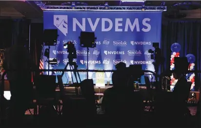  ?? ISAAC BREKKEN / THE NEW YORK TIMES FILE (2018) ?? Cameras are trained on the stage at the Nevada Democratic Party’s election night party Nov. 6, 2018, at Caesars Palace. This weekend, a coalition of progressiv­e candidates took over the party’s leadership.