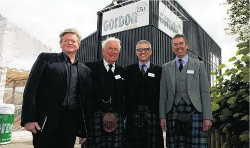  ??  ?? POSITIVE: From left, CMM architect Robert Carrick, chairman Ronald D. Gordon, and joint managing directors Scott and Ronald Gordon