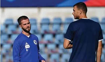  ?? Photograph: Franck Fife/AFP/Getty Images ?? Miralem Pjanic (left) and Edin Dzeko, pictured in 2021, have both spoken out against plans for Bosnia to play Russia in November.