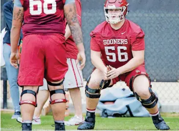  ?? [PHOTO BY CHRIS LANDSBERGE­R, THE OKLAHOMAN] ?? Oklahoma’s Creed Humphrey (56) works out with the offensive line during the first day of spring practice. Humphrey, a redshirt freshman, is now the starting center.