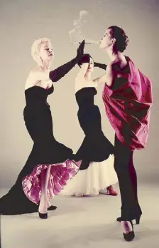  ?? (Photo courtesy of V&A) ?? Two Spanish-influenced Balenciaga sheath evening ensembles reminiscen­t of flamenco dresses (left) and one swathed with drapery as worn by the Virgin Mary in paintings by Murillo and Zurbaran (right), Vogue 1951.