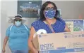  ?? NICK OZA/THE REPUBLIC ?? Health workers Veronica TavenaPere­z, left, and Graciela Holguin deliver supplies.