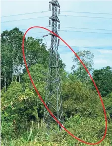  ??  ?? Broken conductors on 33kV high tension tower (circled).