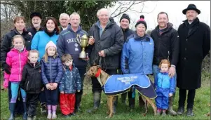  ??  ?? The Butler family (sponsors) presenting the Derby Trial Stake and Dick Fortune Perpetual Trophy to the winning owner, Anthony Hussey, at the 90th annual Loch Garman Cup meeting at Woodlands, Enniscorth­y.