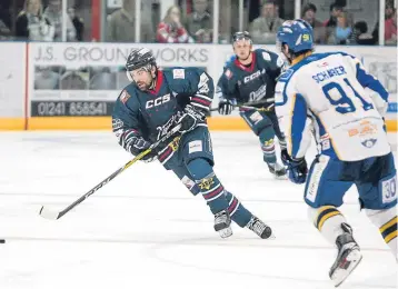  ??  ?? Stars’ Vinny Scarsella powers past Flyers’ Chase Schaber.