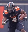  ?? SOOBUM IM/USA TODAY SPORTS ?? Oregon State running back B.J. Baylor leads the Pac-12 in rushing with 1,050 yards on 176 carries and 12 touchdowns.