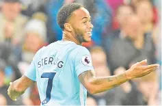  ?? — AFP photo ?? Manchester City's English midfielder Raheem Sterling celebrates scoring their second goal during the English Premier League football match between Manchester City and Bournemout­h at the Etihad Stadium in Manchester, north west England, on December 23,...