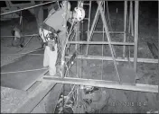  ?? MARICOPA COUNTY SHERIFF’S OFFICE VIA AP ?? THIS PHOTO PROVIDED by the Maricopa County Sheriff’s Office shows a rescue team lowering themselves into an old abandoned mine shaft to rescue a man who fell into the shaft on Monday near Aguila, Ariz.