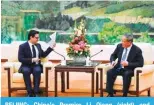  ?? — AFP ?? BEIJING: China’s Premier Li Qiang (right) and France’s Minister for Foreign and European Affairs Stephane Sejourne attend a meeting at the Great Hall of the People in Beijing on April 1, 2024.