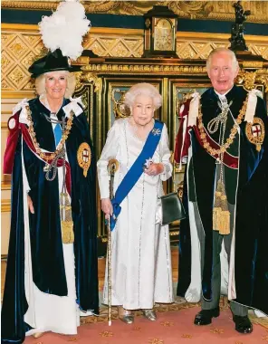 ?? ?? Ceremony: The Queen with Charles and Camilla ahead of the service