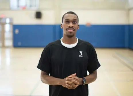  ?? NICK KOZAK FOR THE TORONTO STAR ?? Lorenzo Freeman has been involved with the Y since he was a young boy. He now mentors others at the Scarboroug­h Town Centre Ct. location.