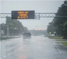  ?? /ANDREW CABALLERO-REYNOLDS/AFP/GETTY IMAGES ?? Fuertes lluvias cayeron ayer en Wilmington, Carolina del Norte, a medida que el huracán Florence se acercaba a la zona costera.