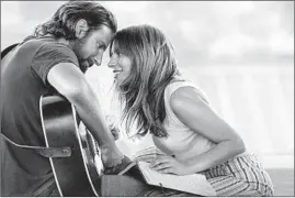  ?? NEAL PRESTON / WARNER BROS. PICTURES ?? “A Star is Born,” starring Bradley Cooper and Lady Gaga, is persuasive in its performanc­e sequences, and frequently, crudely powerful in the dramatic encounters.