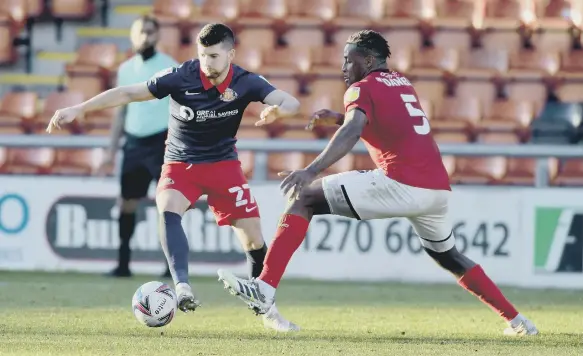  ??  ?? Jordan Jones cuts in before scoring against Crewe Alexandra.