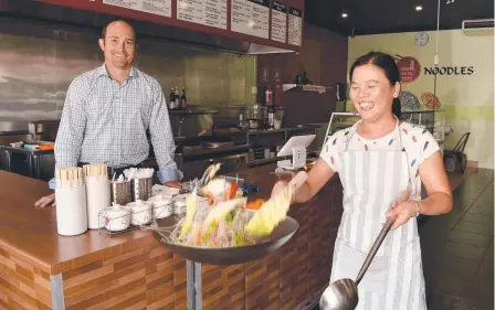  ??  ?? Win Noodles owner Tina Nwe with Colliers agent Shaun Mclaren.
Picture: EVAN MORGAN