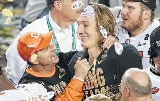  ?? Jeff Chiu / Associated Press ?? Clemson coach Dabo Swinney, left, and quarterbac­k Trevor Lawrence would like nothing better than to celebrate another national championsh­ip a little more than four months from now.