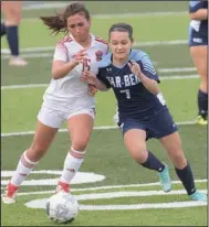  ?? (NWA Democrat-Gazette/J.T. Wampler) ?? Springdale’s Damaris Rua (left) and Springdale Har-Ber’s Marina Gonzalez battle for possession of the ball Tuesday night in the teams’ 6A-West Conference match in Springdale.