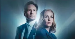  ??  ?? David Duchovny and Gillian Anderson star in “The X-Files”