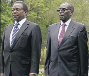  ??  ?? Lost power... former Vice President Mnangagwa with Mugabe before fallout