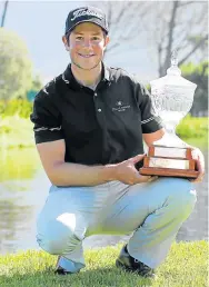 ?? Picture: PETRI OESCHGER/ SUNSHINE TOUR/GALLO IMAGES ?? MAIDEN VICTORY: Welshman Rhys Enoch shows his trophy after the Cape Town Open at the King David Mowbray Golf Club