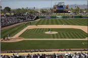  ?? SUE OGROCKI — THE ASSOCIATED PRESS ?? The A’s Joakim Soria delivers a pitch to the Dodgers’ Devin Mann in the sixth inning of a spring training game on March 5 in Mesa, Ariz.