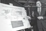  ?? RICHARD DREW, AP ?? Preet Bharara, U.S. Attorney for the Southern District of New York, describes a chart showing the global interests of Liberty Reserve, during a news conference in New York on Tuesday.