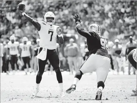  ?? Kevork Djansezian Getty Images ?? THE CHARGERS’ Cardale Jones, vying for the No. 3 quarterbac­k spot, completed 10 of 14 passes for 111 yards in Sunday’s exhibition.