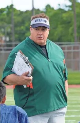  ?? PHOTOS PROVIDED BY SCOTT YAMANO/NETFLIX ?? Kevin James dons a visor and whistle to play suspended NFL coach Sean Payton in “Home Team.”