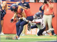  ?? Rich Barnes / Getty Images ?? Syracuse’s Gabe Horan, left, is tackled by UConn’s Omar Fortt during a 2018 game at the Carrier Dome.