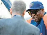  ?? KEVIN M. COX/AP ?? Astros manager Dusty Baker Jr., right, is ninth on the career wins list with 2,093. No manager has won that many games without a World Series title.