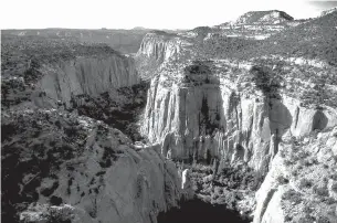  ?? Associated Press ?? n This undated photo shows the Upper Gulch section of the Escalante Canyons within Utah’s Grand Staircase-Escalante National Monument, which features sheer sandstone walls, broken occasional­ly by tributary canyons. Interior Secretary Ryan Zinke said...