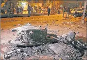  ?? HT ARCHIVE ?? Charred remains of a vehicle in Jahangirpu­ri after violence broke out on April 16.