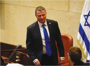  ?? (Knesset Spokespers­on) ?? KNESSET SPEAKER Yuli Edelstein departs his chair after resigning his post yesterday.