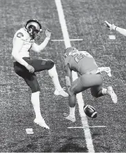  ?? Steve Conner, The Associated Press ?? Boise State’s Avery Williams blocks a punt by Colorado State’s Ryan Stonehouse during the first quarter Thursday. Williams recovered the block in the end zone for a touchdown.