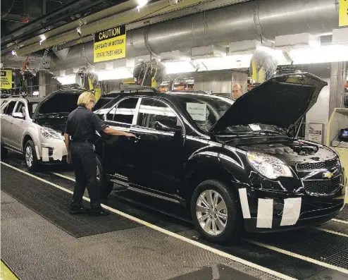  ?? SUN MEDIA ?? Production of the Chevy Equinox will expand at GM’s Ingersoll, Ont., assembly plant but production of the revamped GMC Terrain will move to Mexico from the Canadian factory. GM unveiled its revamped Terrain on Sunday in Detroit.