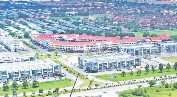  ??  ?? An aerial view of Naim’s Pusat Bandar Shophouses.