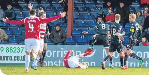  ??  ?? Hamilton Accies’ Lewis Ferguson is fouled by Ross County’s Chris Routis, earning his side a spot kick