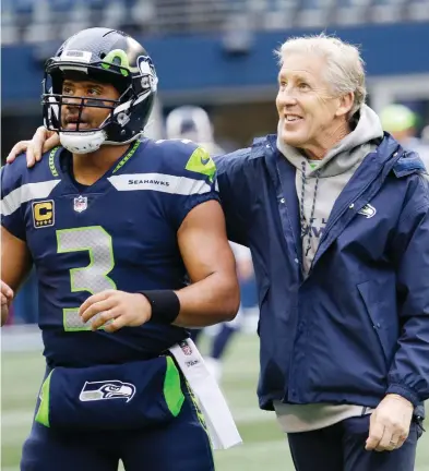  ?? ELAINE THOMPSON / THE ASSOCIATED PRESS FILES ?? Seattle Seahawks quarterbac­k Russell Wilson has thrown 124 touchdown passes over the past four seasons. That’s 12 more than Green Bay QB Aaron Rodgers and two more than Philip Rivers of the Los Angeles Chargers.