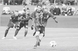  ?? GRAHAM HUGHES
THE CANADIAN PRESS ?? Montreal Impact's Ignacio Piatti scores on a penalty shot.