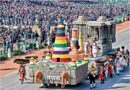  ??  ?? Tableau of Telangana at Rajpath during the full dress rehearsal for the upcoming Republic Day Parade in New Delhi on Thursday.
— PTI