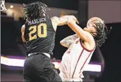  ?? Wally Skalij Los Angeles Times ?? TRE WHITE goes up for a shot while pressured by Alabama State guard TJ Madlock at Galen Center.